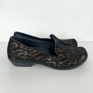 Dansko Olivia Metallic Snake Print Leather Slip-On Clogs in Black/Bronze, 39